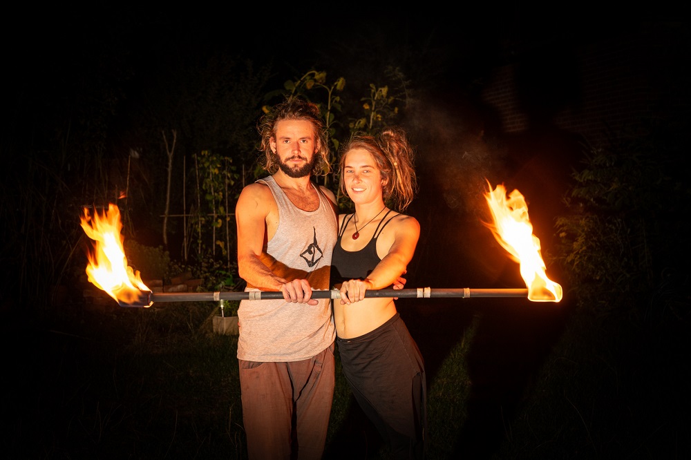Lena and Hannes fire acrobatics with fire staff